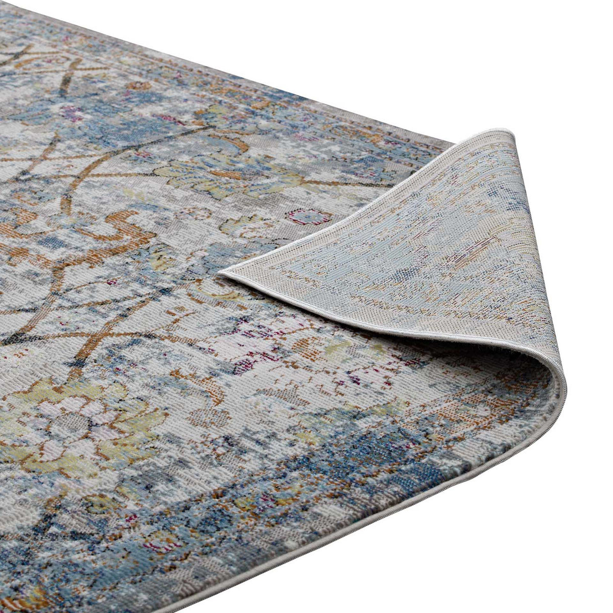 Pale woven backing supports an airy, light blue floral surface