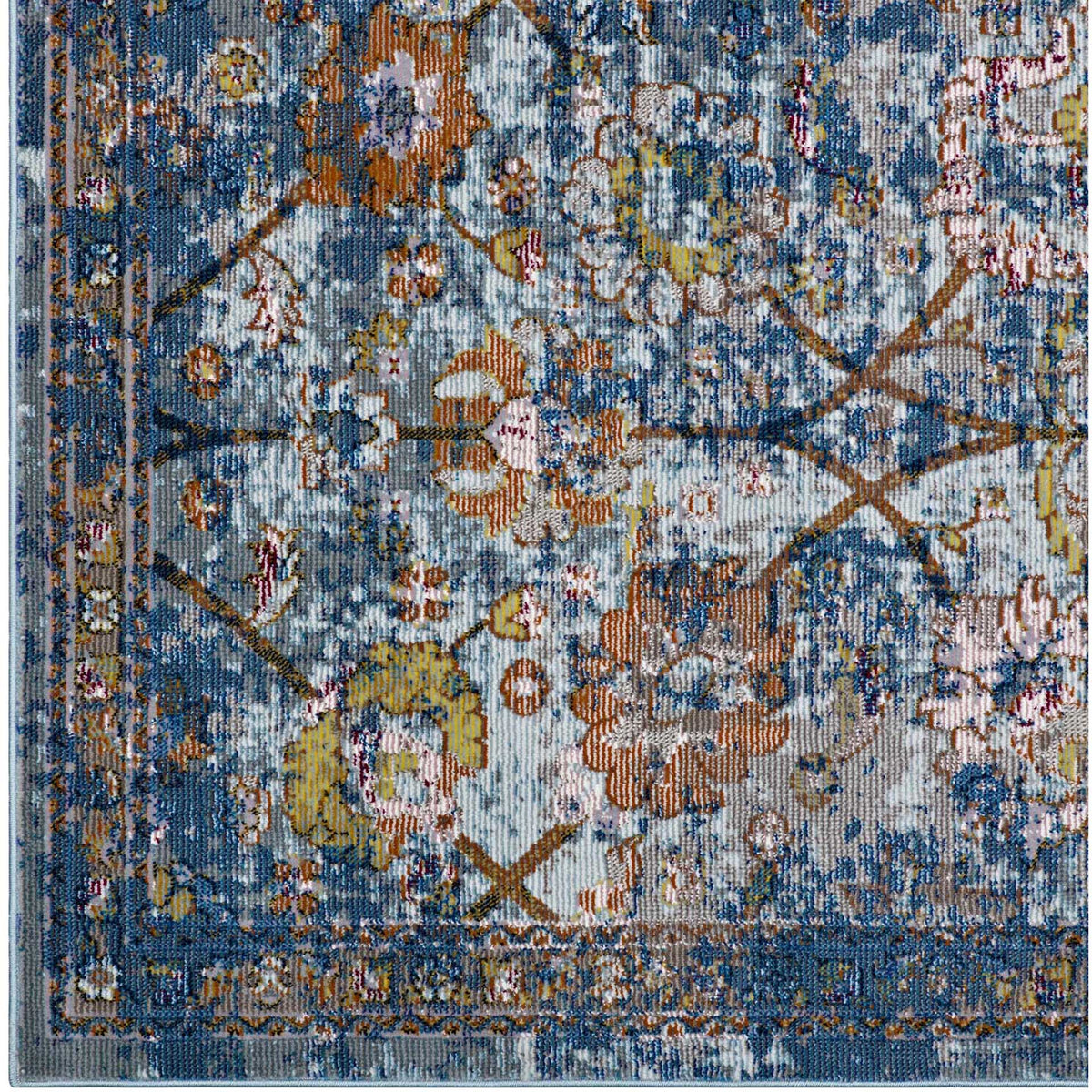 Orange and gold blooms enliven the blue-gray lattice and decorative rug border