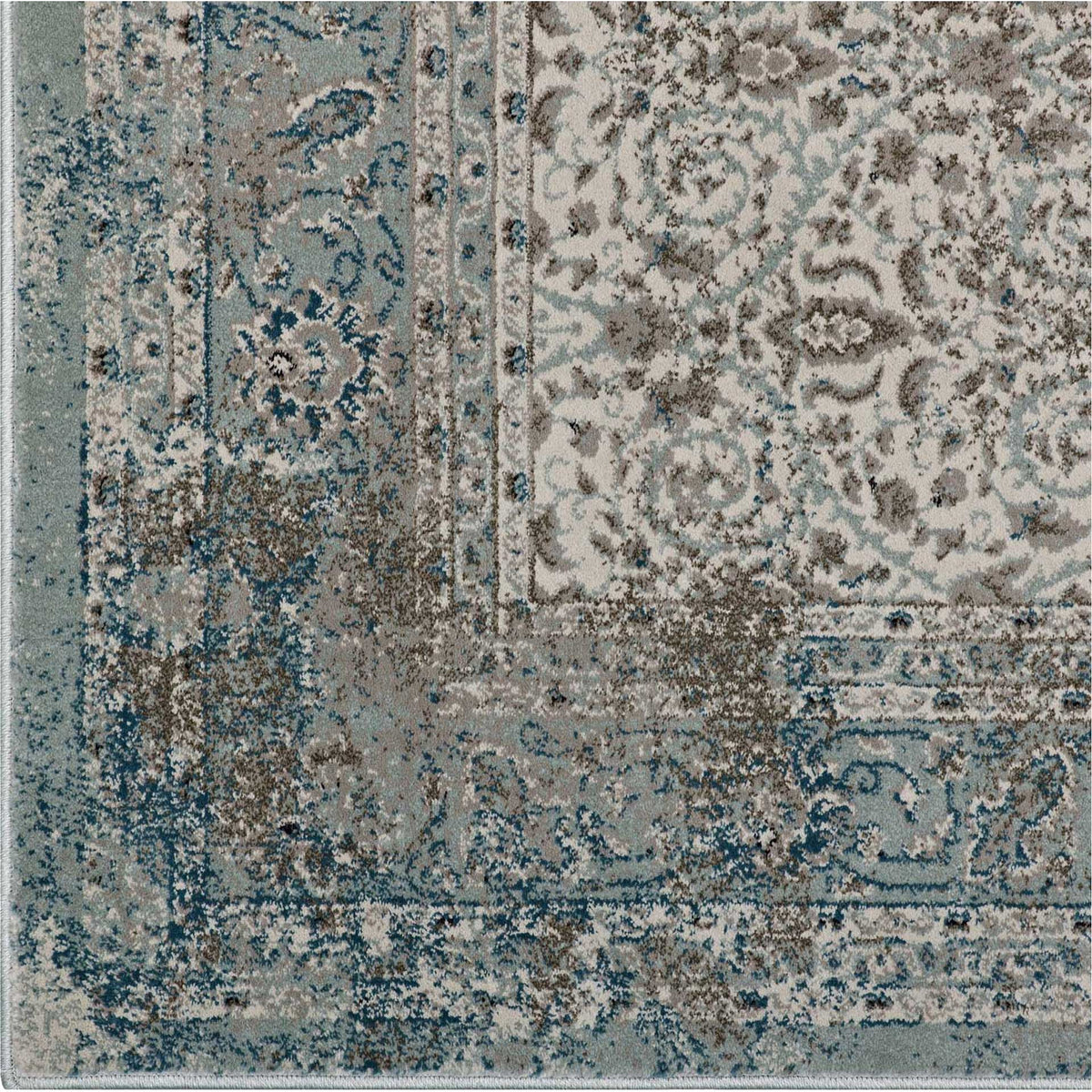 An ornate border blends muted teal scrollwork with faded brown and beige floral details.