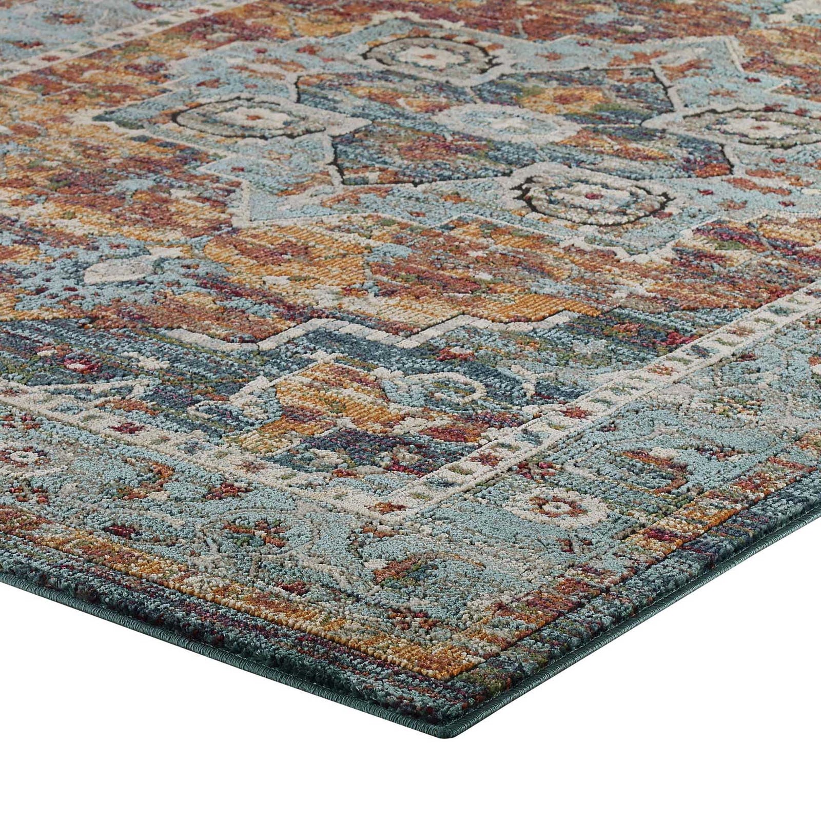 Ornate rust and navy medallion flourishes stand out against a blue floral border || R-1190B-810 || top_studio