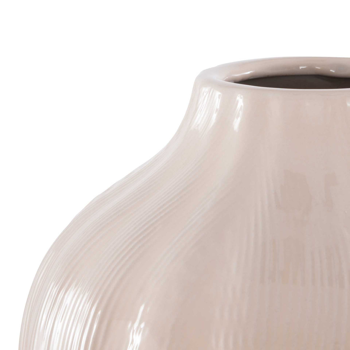 Fine fluting runs from the narrow mouth across the rounded shoulder of a glossy ivory ceramic vase.