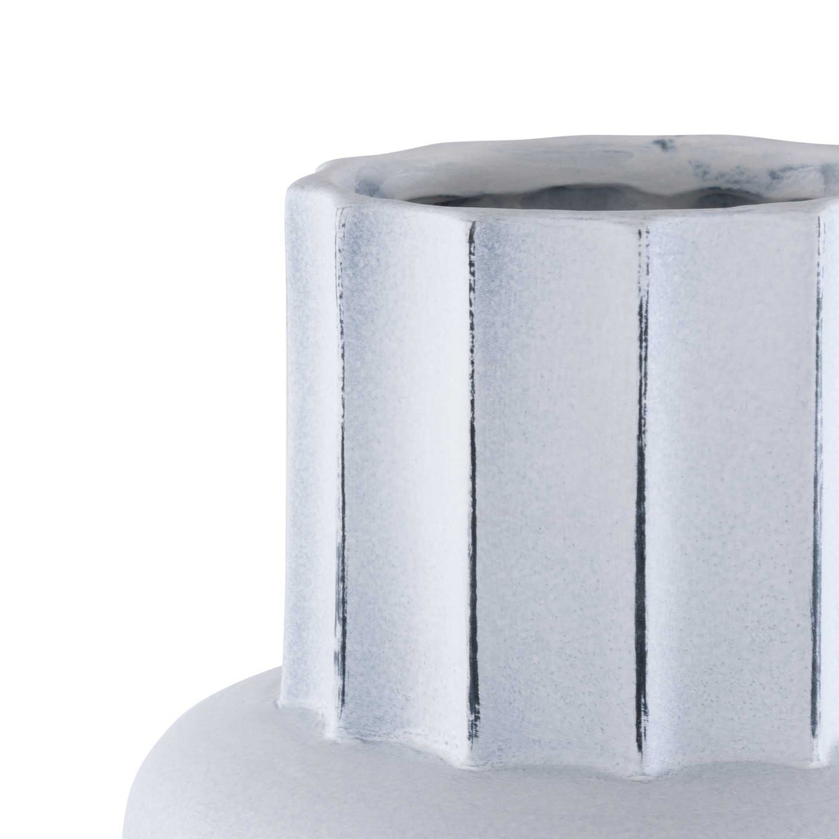 Dark accents trace the fluted neck above a softly rounded band on an antique white ceramic vase.