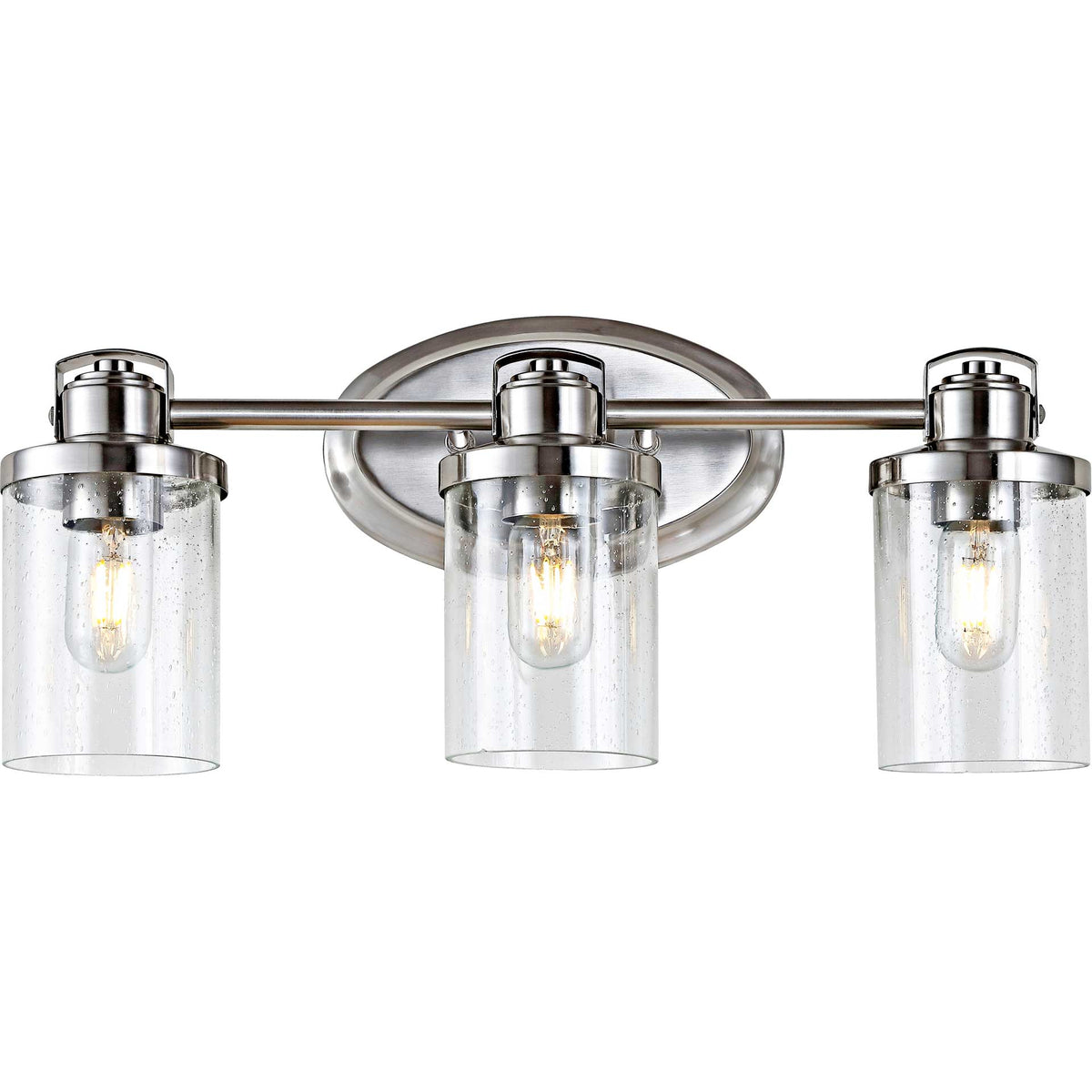 Warm bulbs glow inside three clear glass shades on a sleek nickel-finish wall sconce