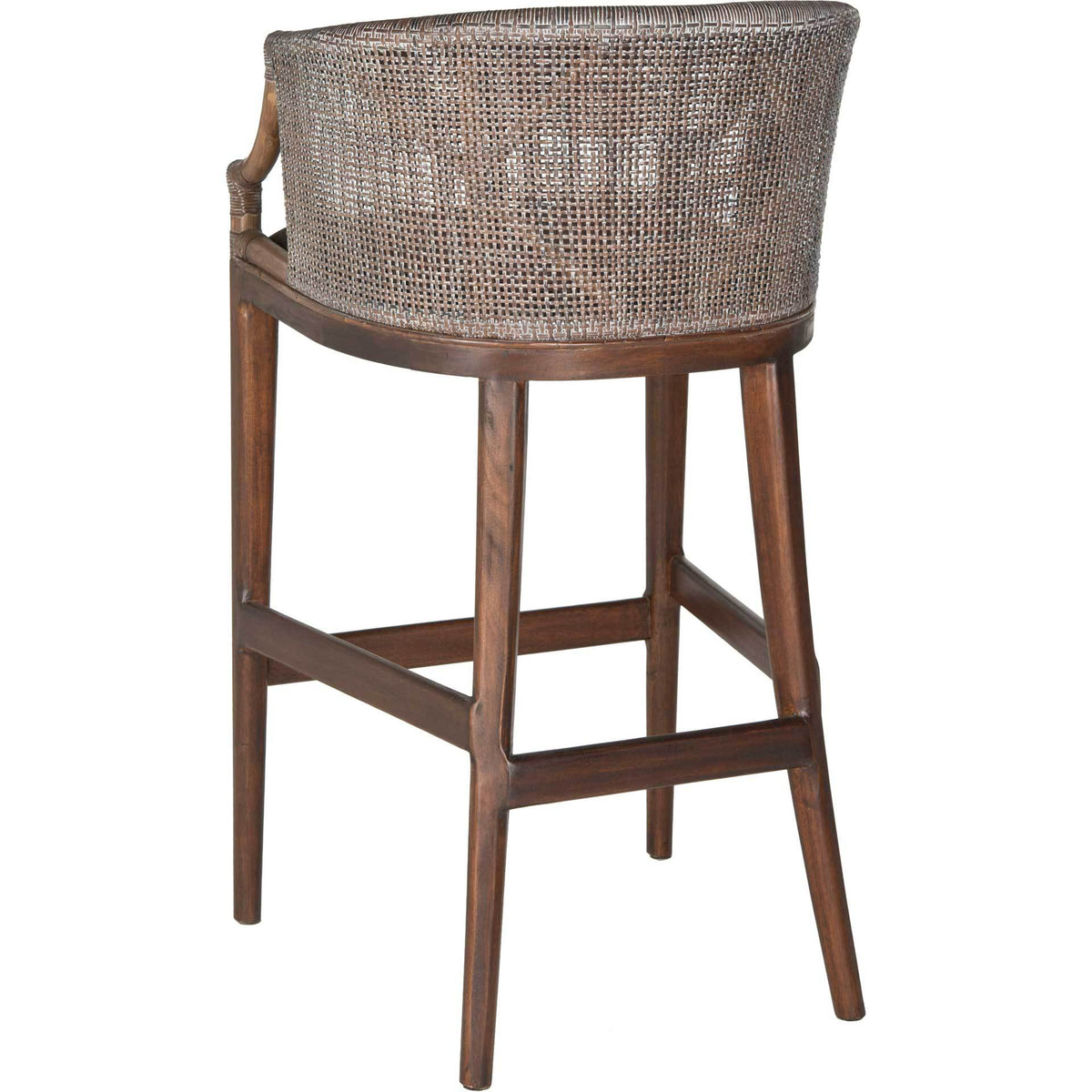 A wide woven back curves around the mahogany frame above slender legs