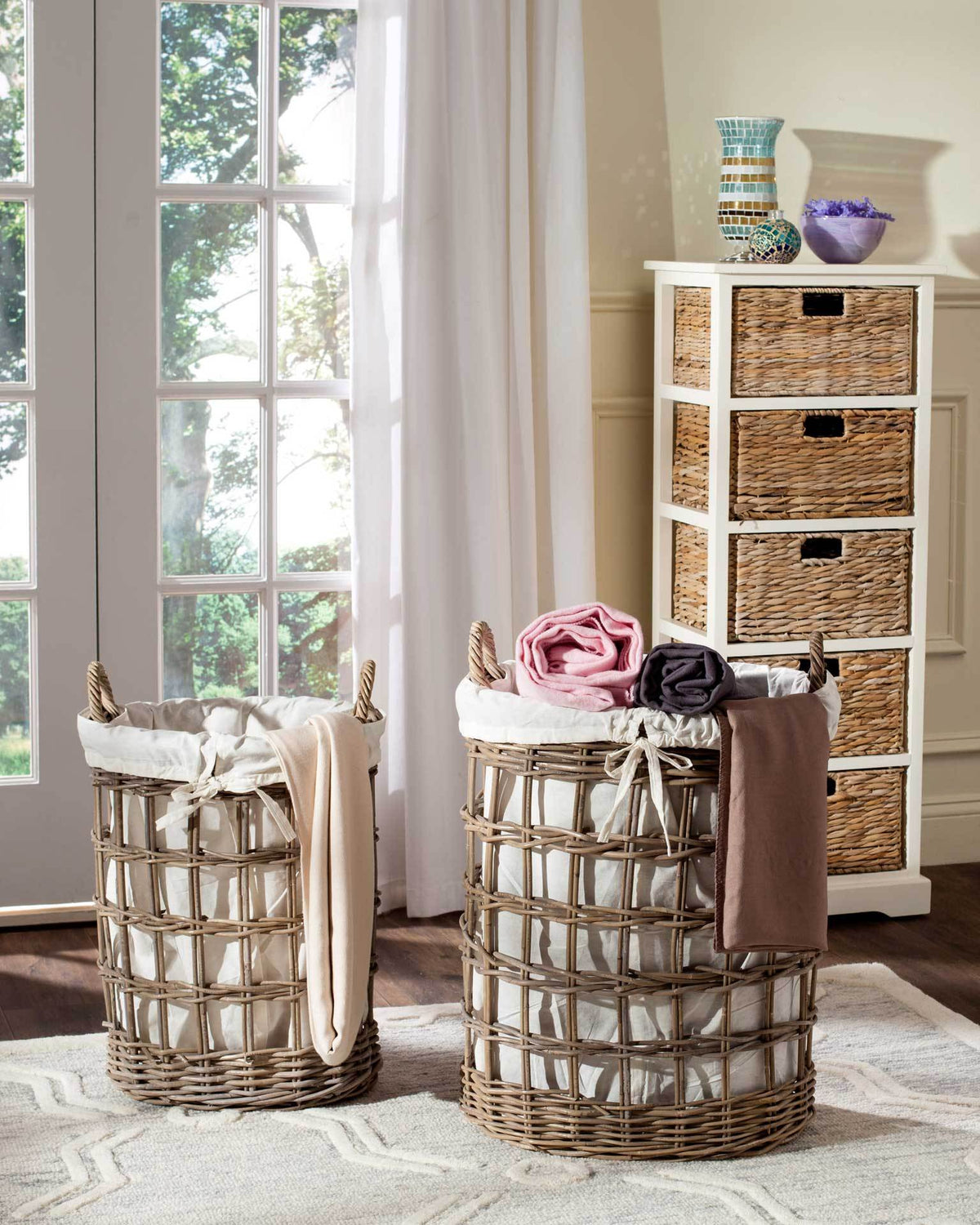 Two rattan hampers with white liners keep laundry organized while adding natural woven texture to the home