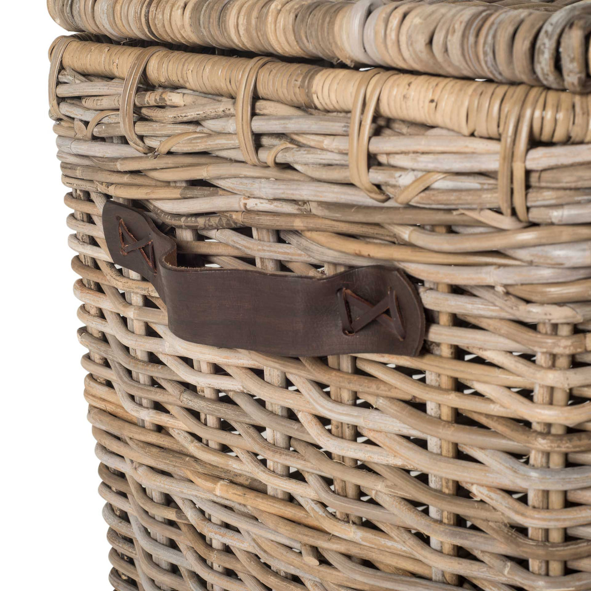 Dark side handle provides a practical accent against tightly woven rattan