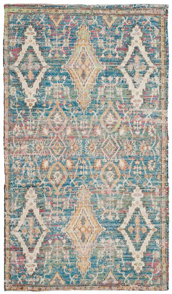 Compact turquoise and peach area rug with geometric diamonds and a vintage-inspired pattern