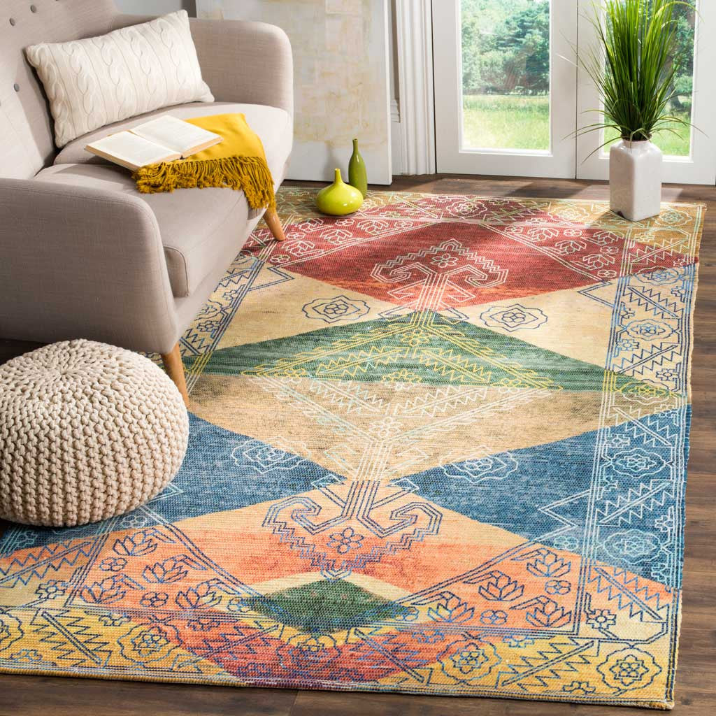 Layered geometric medallions in warm coral and deep teal add lively color beside neutral furnishings.