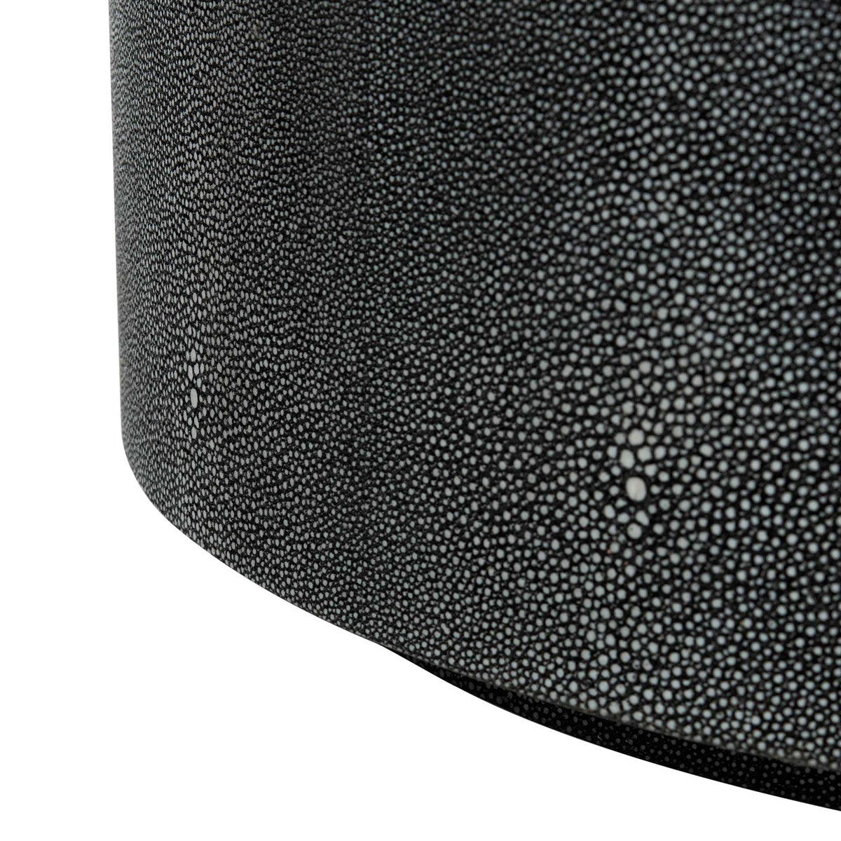 Textured drum base ends in a slim black foot for a clean, grounded look