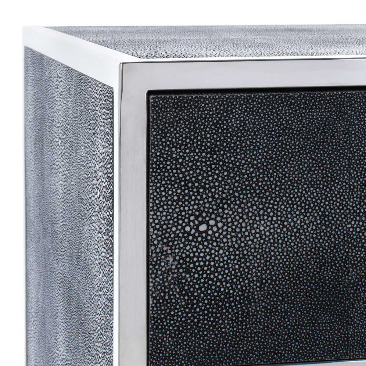 Pebbled faux shagreen covers the nightstand's top and drawer beneath crisp silver edging