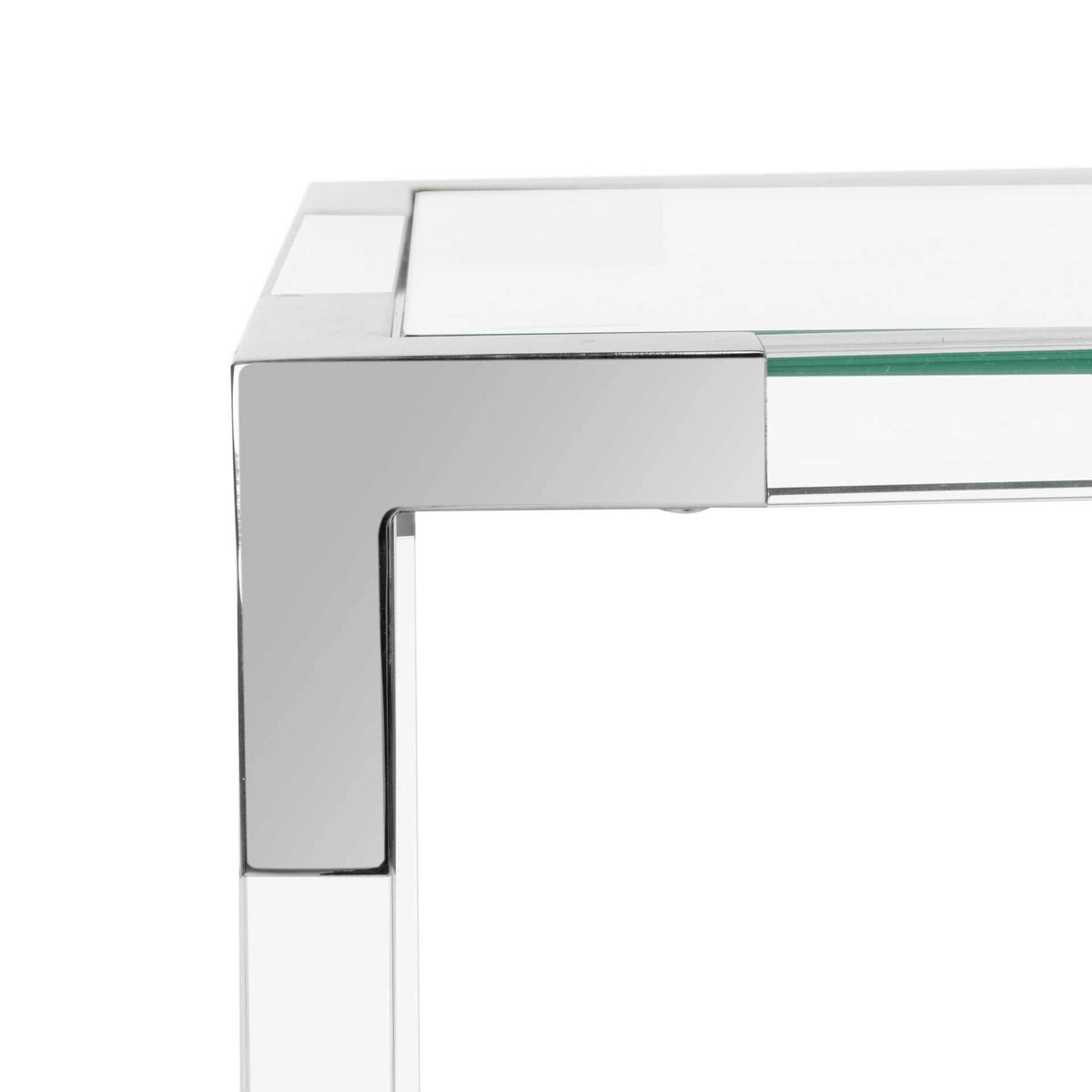 A polished chrome corner joins the inset glass top to a clear acrylic support