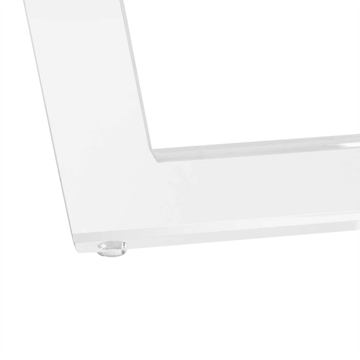 Clear acrylic leg meets a discreet rounded foot beneath the table