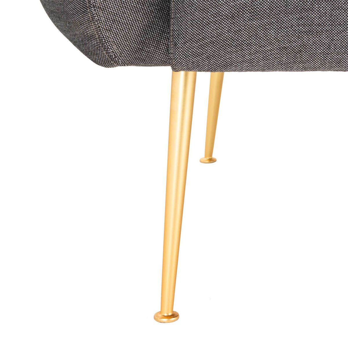 Slender, tapered gold-tone legs add a warm metallic contrast to the gray upholstery.