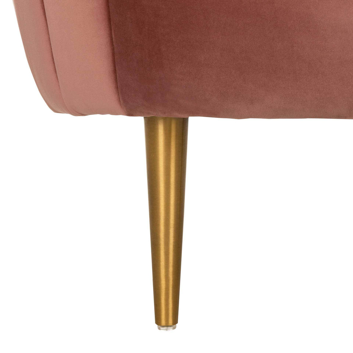 A slender tapered gold metal leg contrasts with the dusty rose velvet upholstery