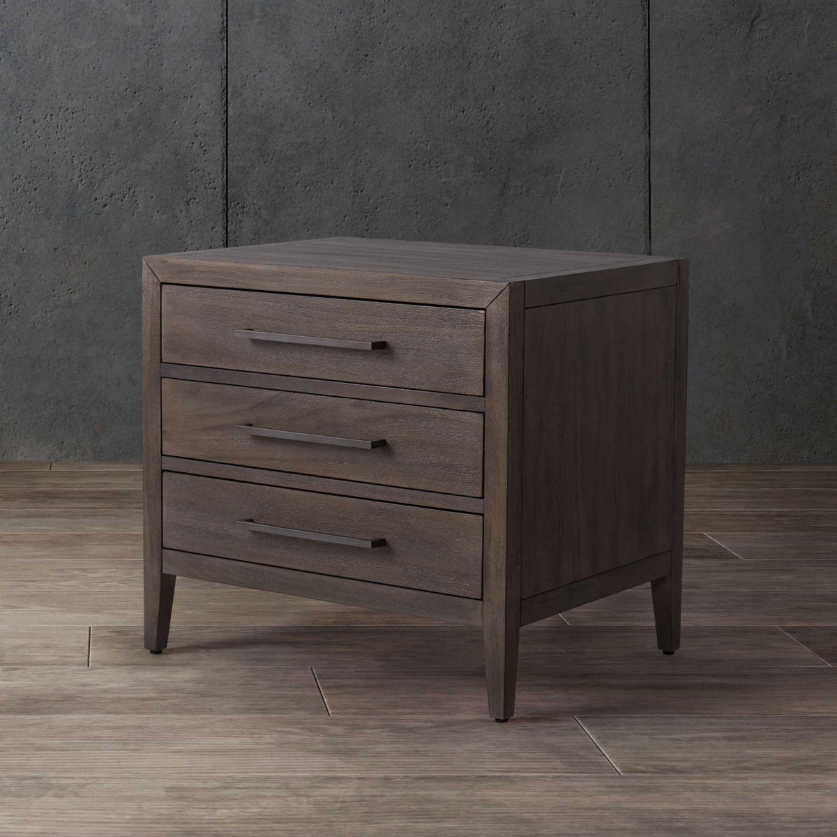 Muted light brown wood and three metal pulls make practical storage feel effortlessly refined.