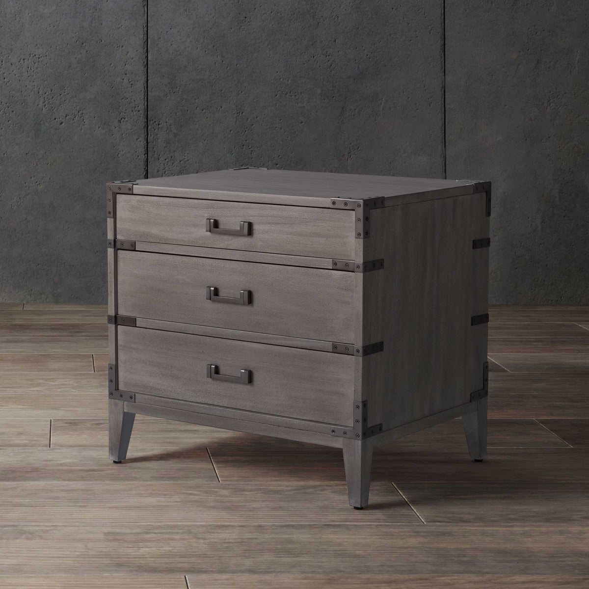 Light gray wood grain, dark metal trim, and three drawers give this nightstand an industrial feel