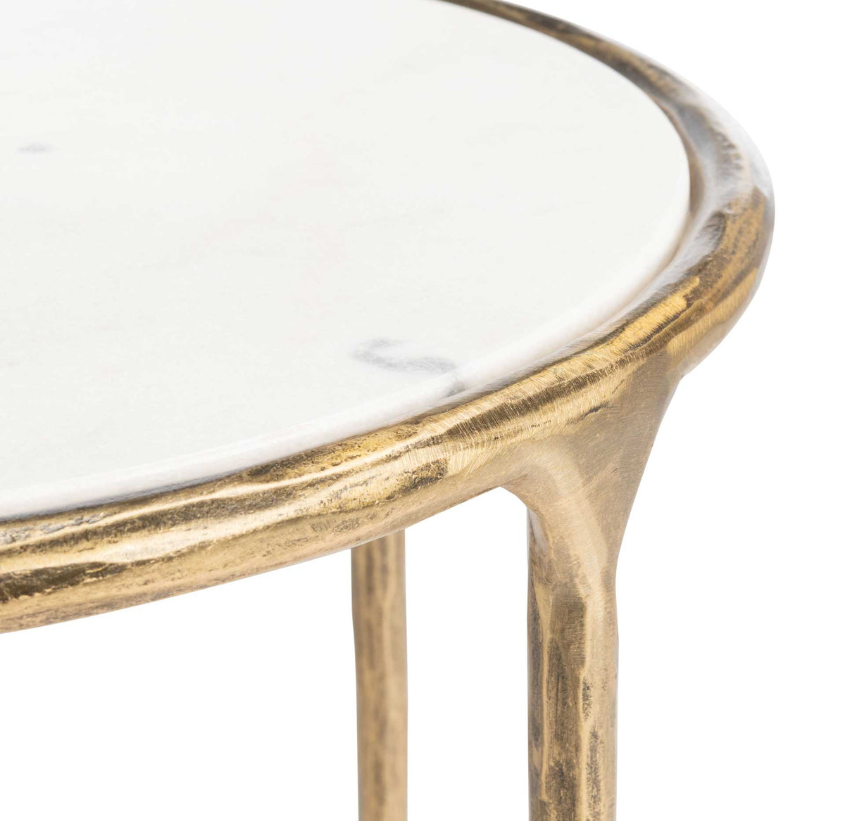 Subtle gray veining marks the white marble top inside a textured brass-toned rim.