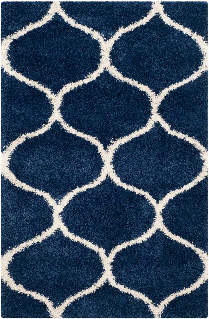 Navy rectangular shag rug with broad ivory rounded outlines