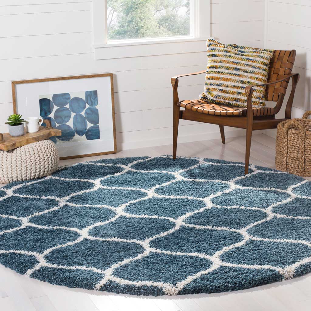 A cool blue pile and ivory ogee pattern add soft texture and graphic charm