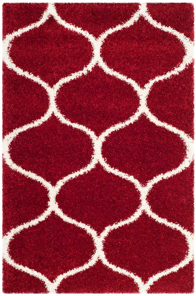 Red rectangular shag rug with broad ivory curved diamonds