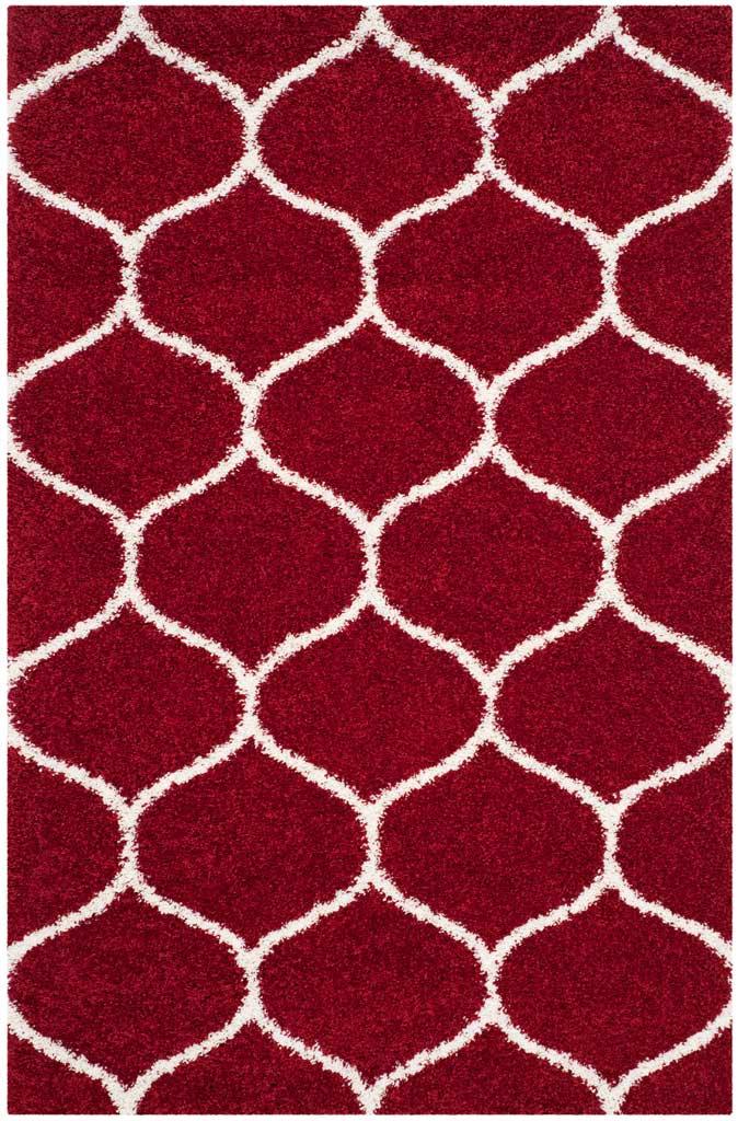 Ivory outlines create soft rounded shapes across vivid red shag