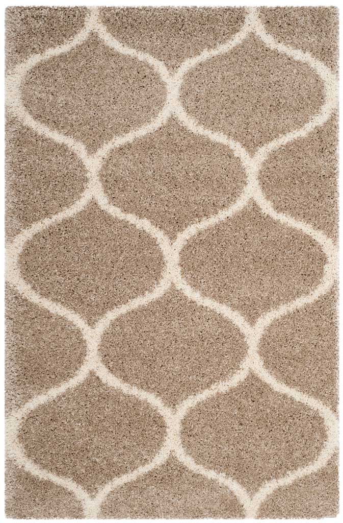 Beige rectangular shag rug with broad ivory rounded lattice lines