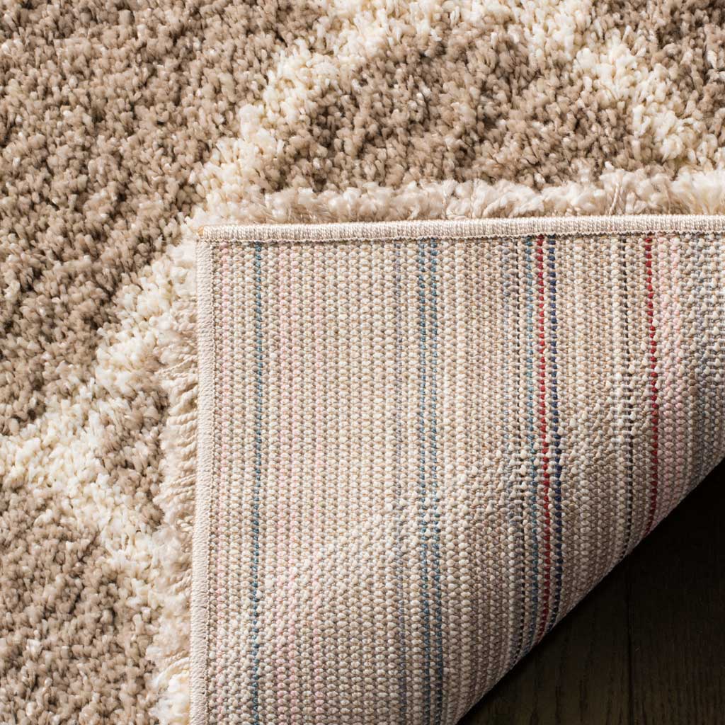 Woven underside with subtle stripes supports the beige shag pile
