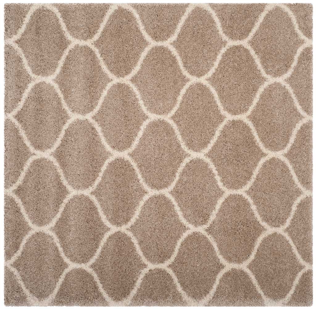 Square beige rug patterned with interlocking ivory curves