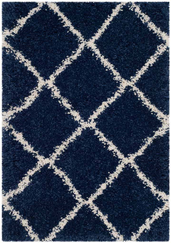 Navy shag accent rug with contrasting ivory diamonds