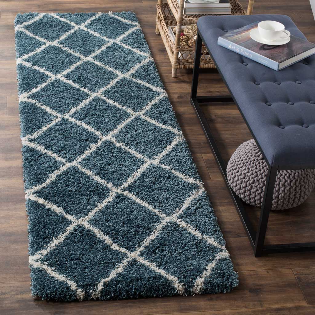 Soft slate blue shag and creamy ivory trellis add layered color and comfort.