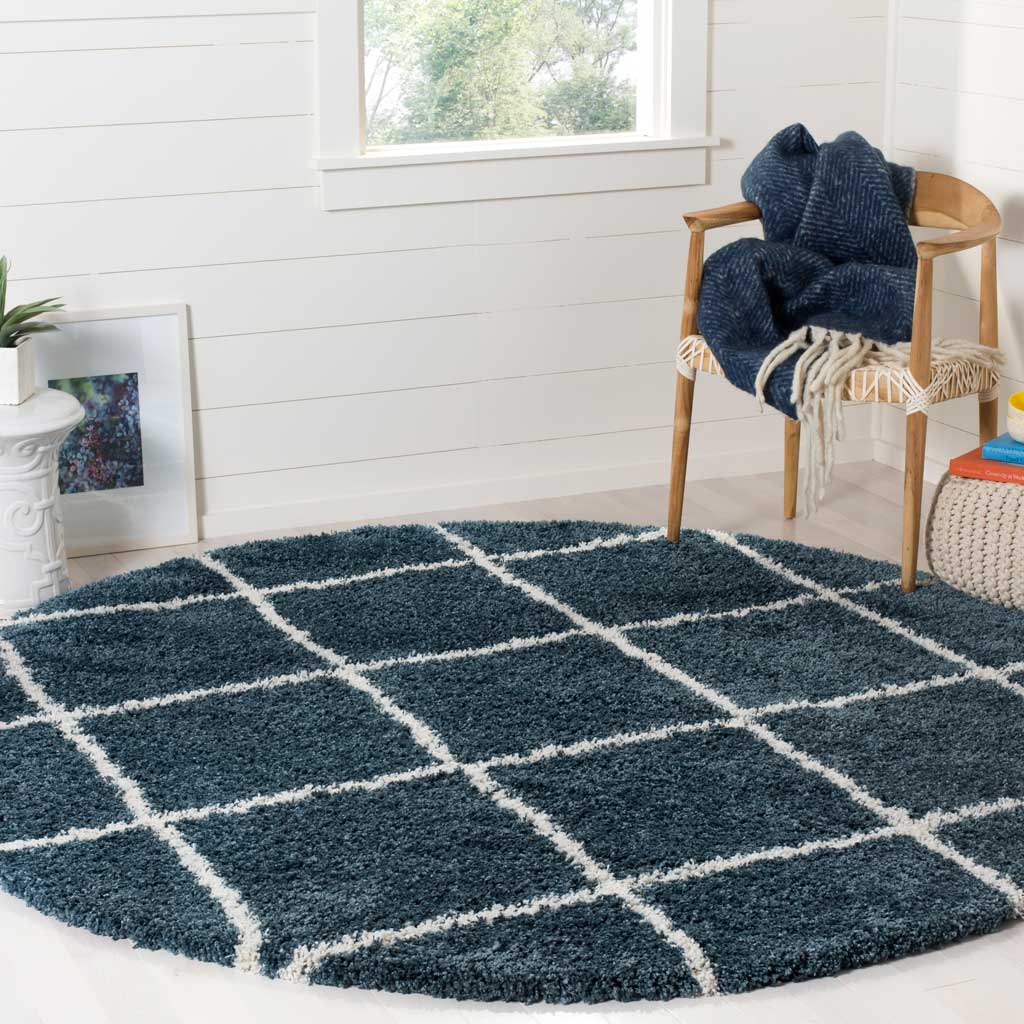 A slate blue pile and ivory lattice bring cool color and cozy texture underfoot
