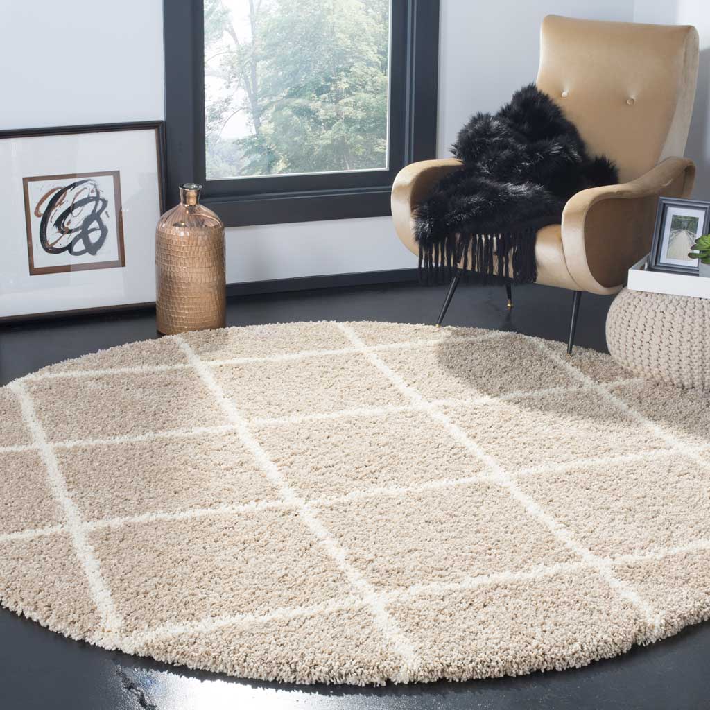 A beige-and-ivory trellis brings warmth to this generous round shag rug