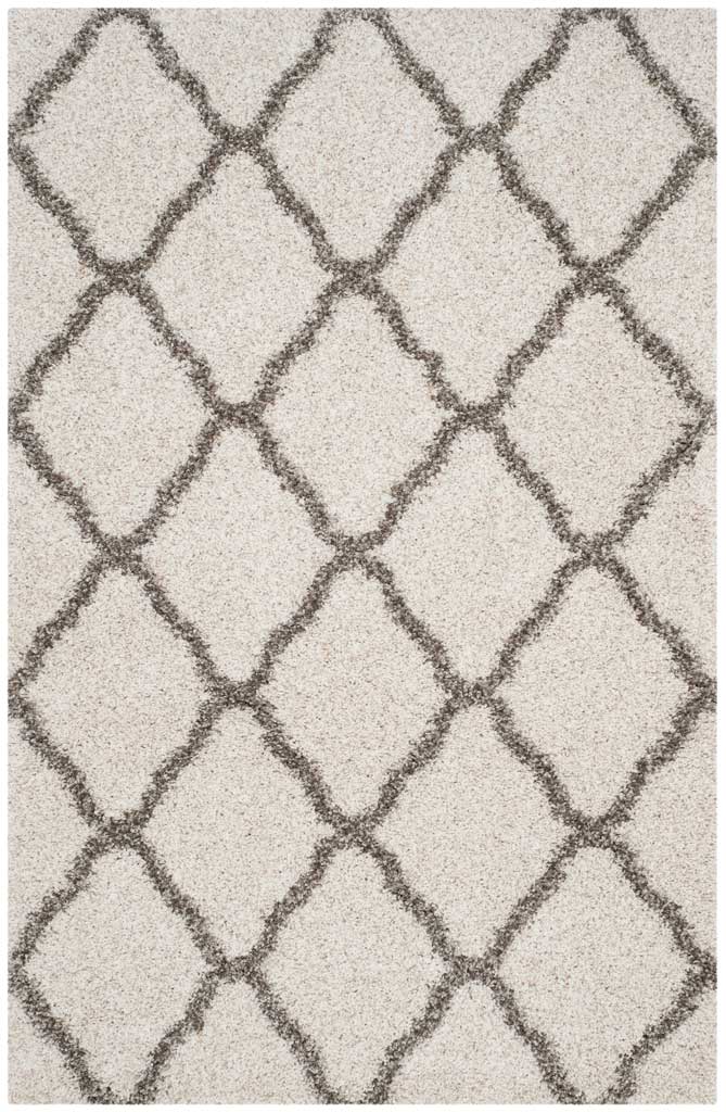 Ivory rectangular shag rug with bold gray curved lattice lines