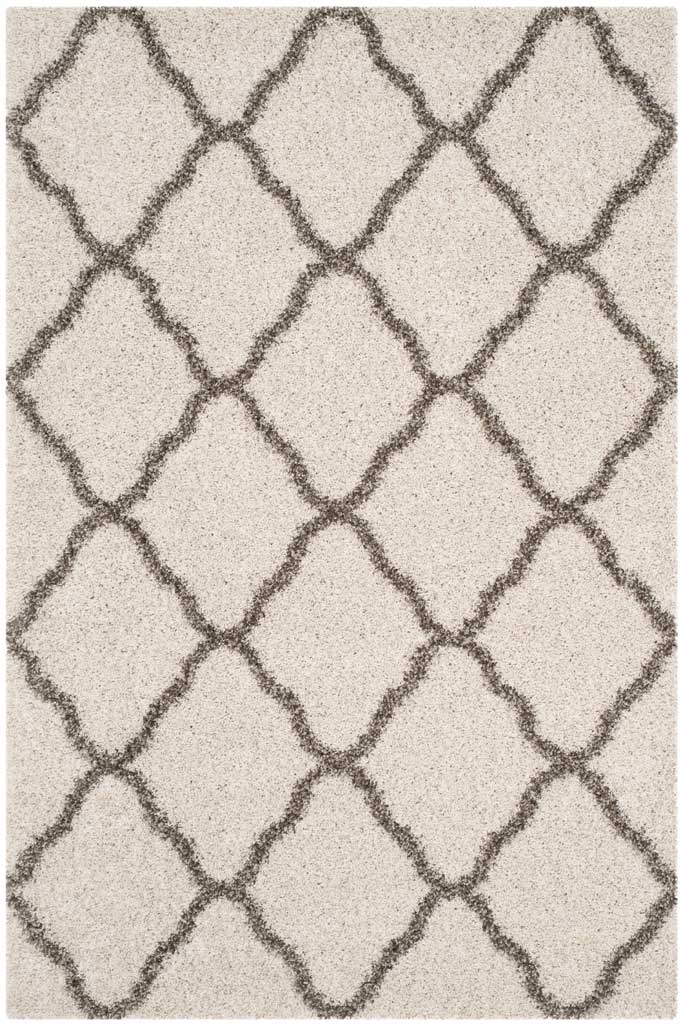 Gray outlines create soft diamond shapes across ivory shag