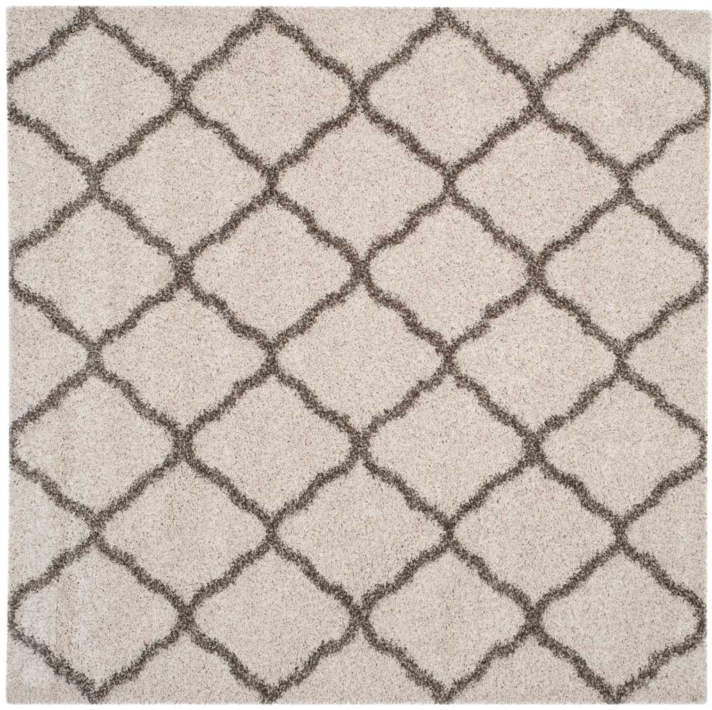 Square ivory rug crossed by interlocking gray curved diamonds