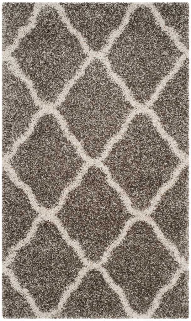 Small gray shag rug with generous ivory curved diamond outlines