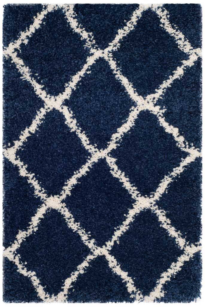 Compact navy shag rug with oversized ivory diamonds