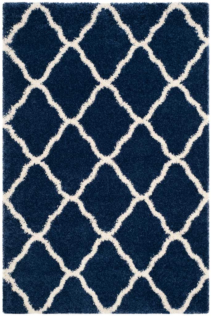 Ivory contours divide deep navy shag into rounded diamonds