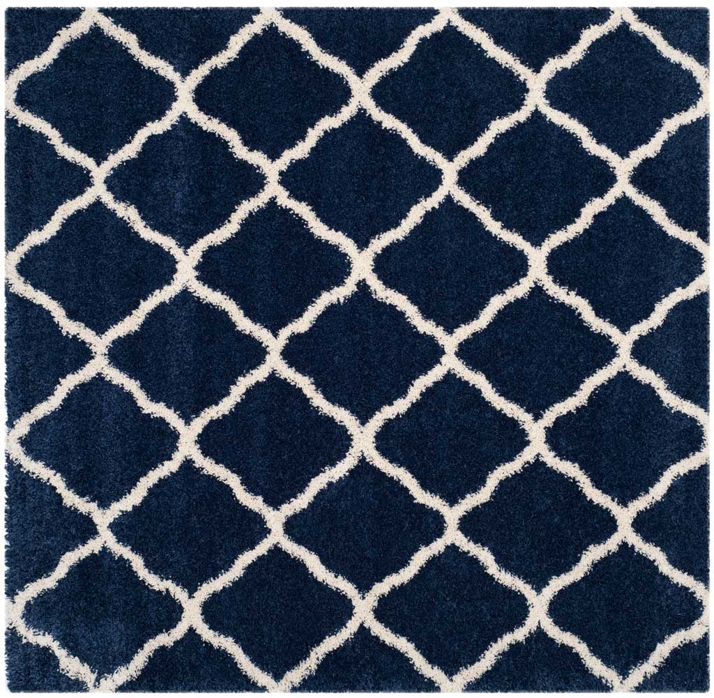 Square navy rug with wide ivory curved diamond outlines