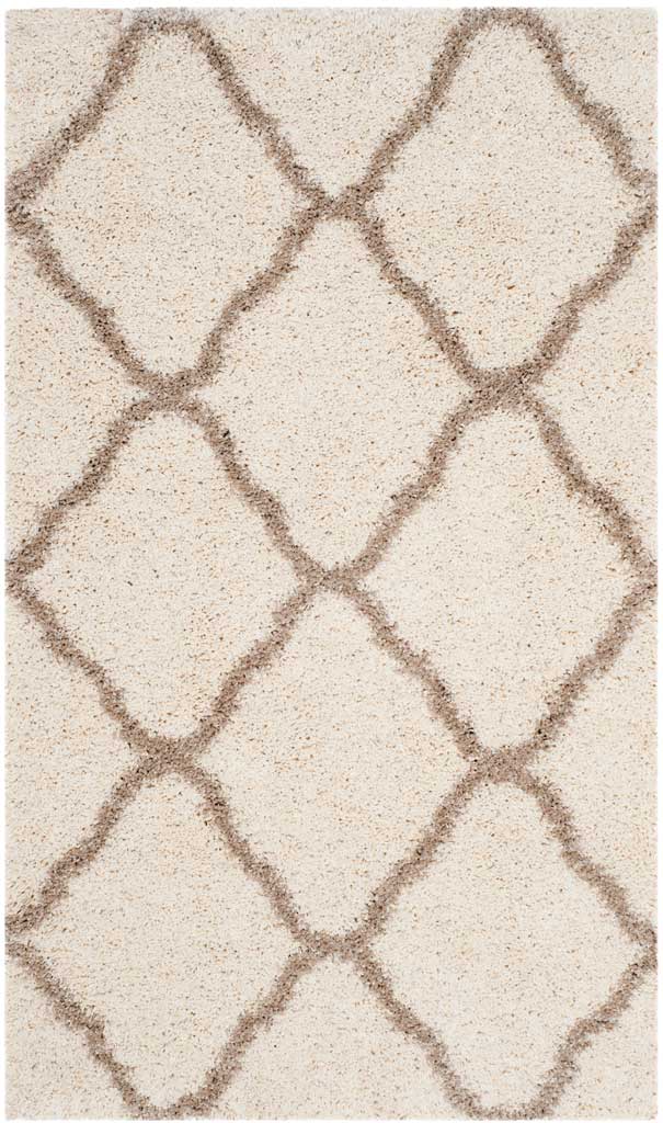 Small ivory shag rug with warm beige curved diamond lines
