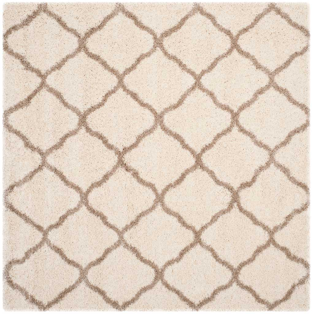 Square ivory rug filled with softly curved beige diamonds