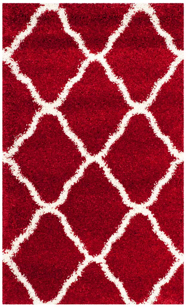 Small red shag rug with generous ivory curved diamonds