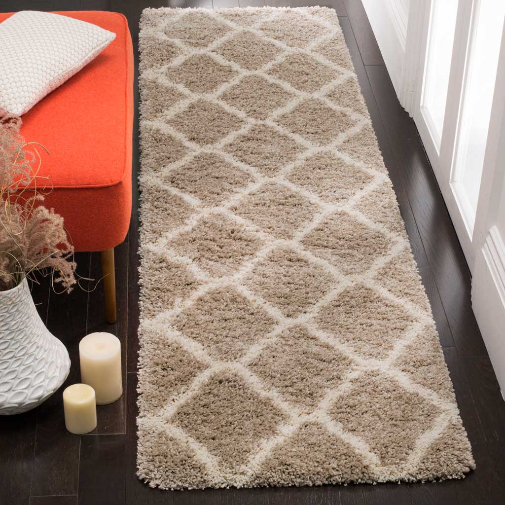 Ivory crisscross lines brighten a warm beige shag surface for cozy floor style.