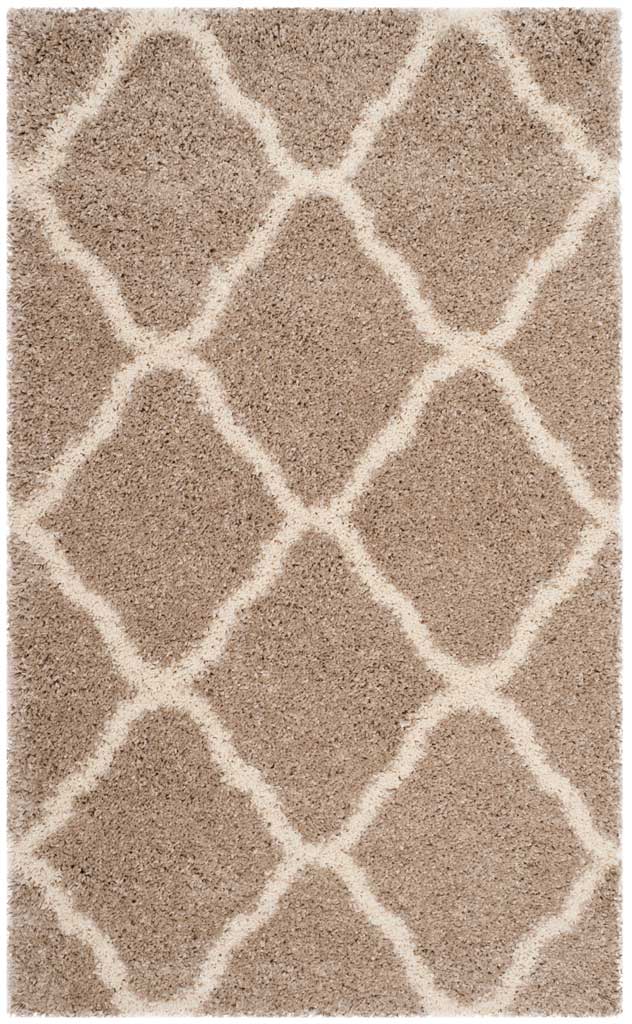 Small beige shag rug with bold ivory curved diamonds