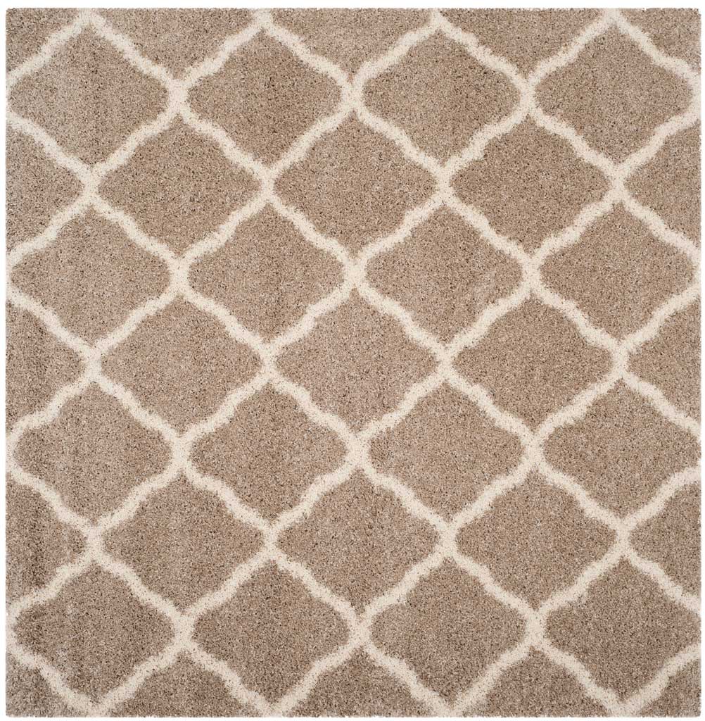 Square beige rug covered in softly curved ivory diamonds