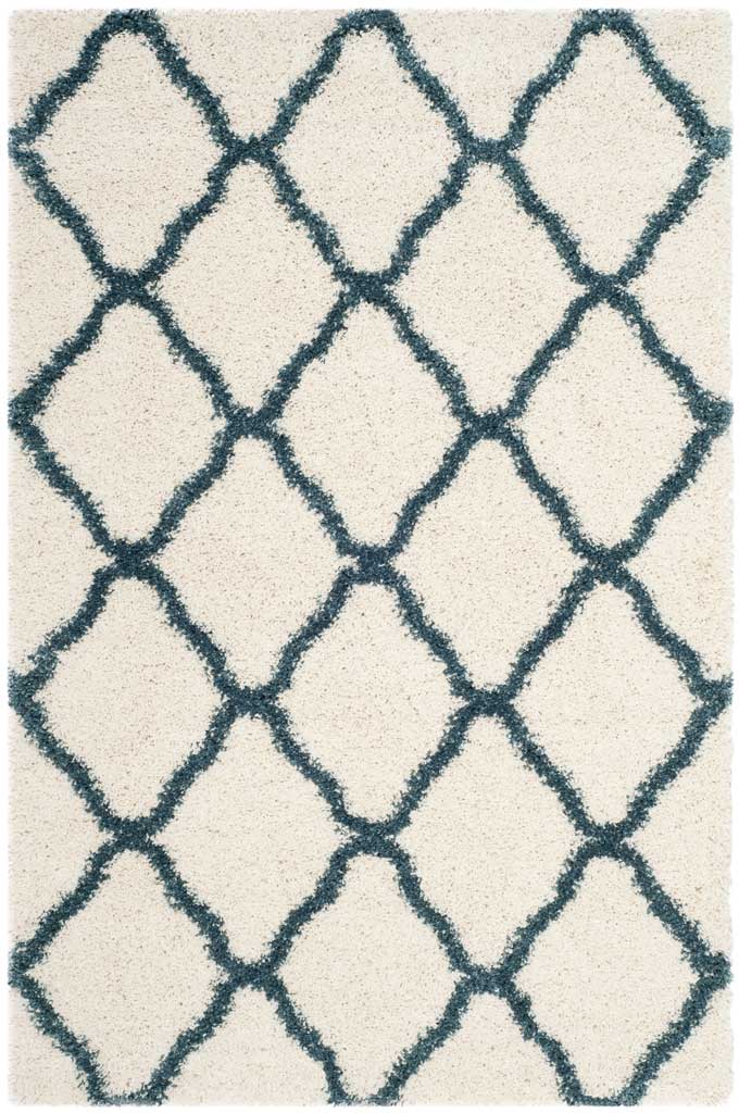 Ivory rectangular shag rug with bold blue diamond outlines