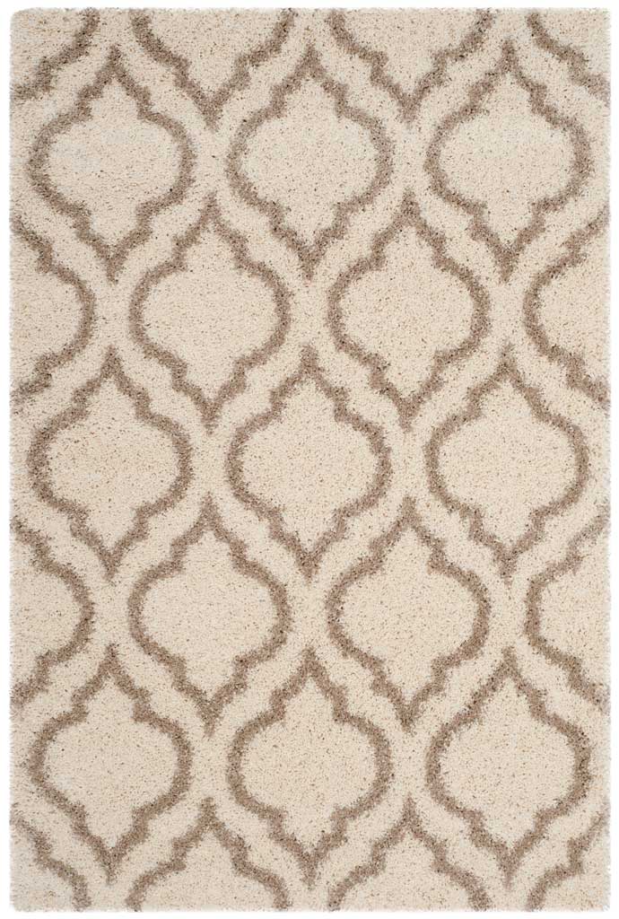 Ivory rectangular rug with a soft beige arabesque lattice