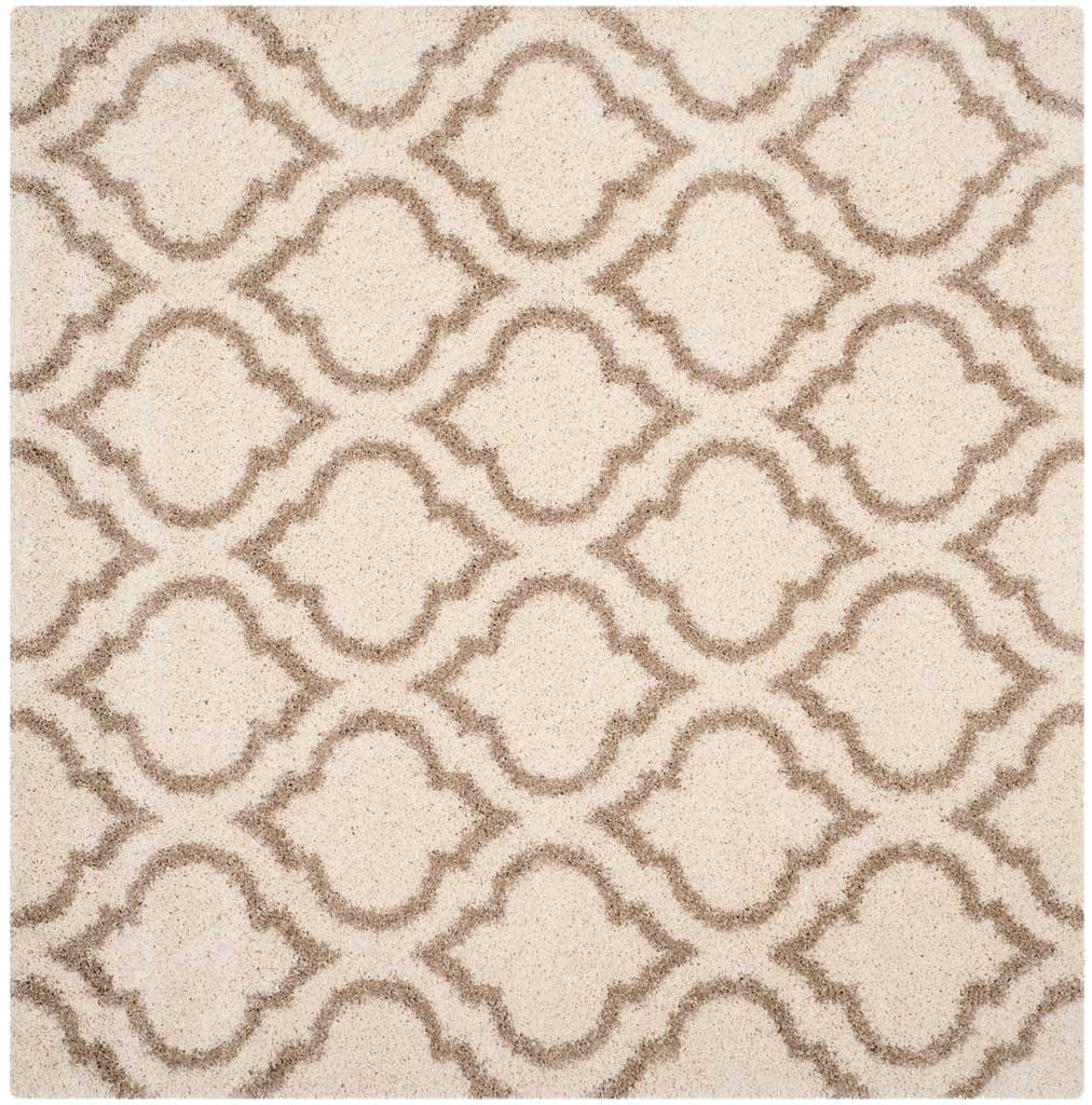Square ivory rug patterned with flowing beige ornamental shapes