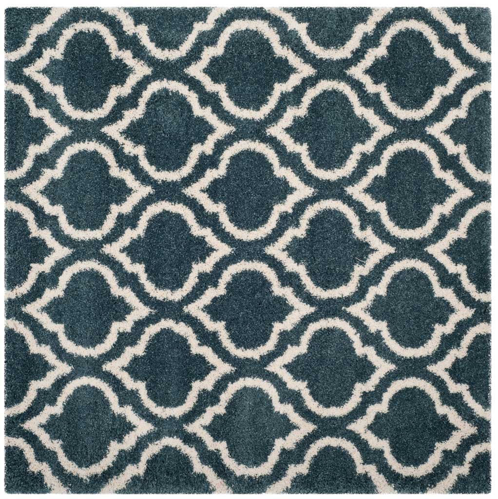 Square slate blue rug with interlocking ivory curved outlines