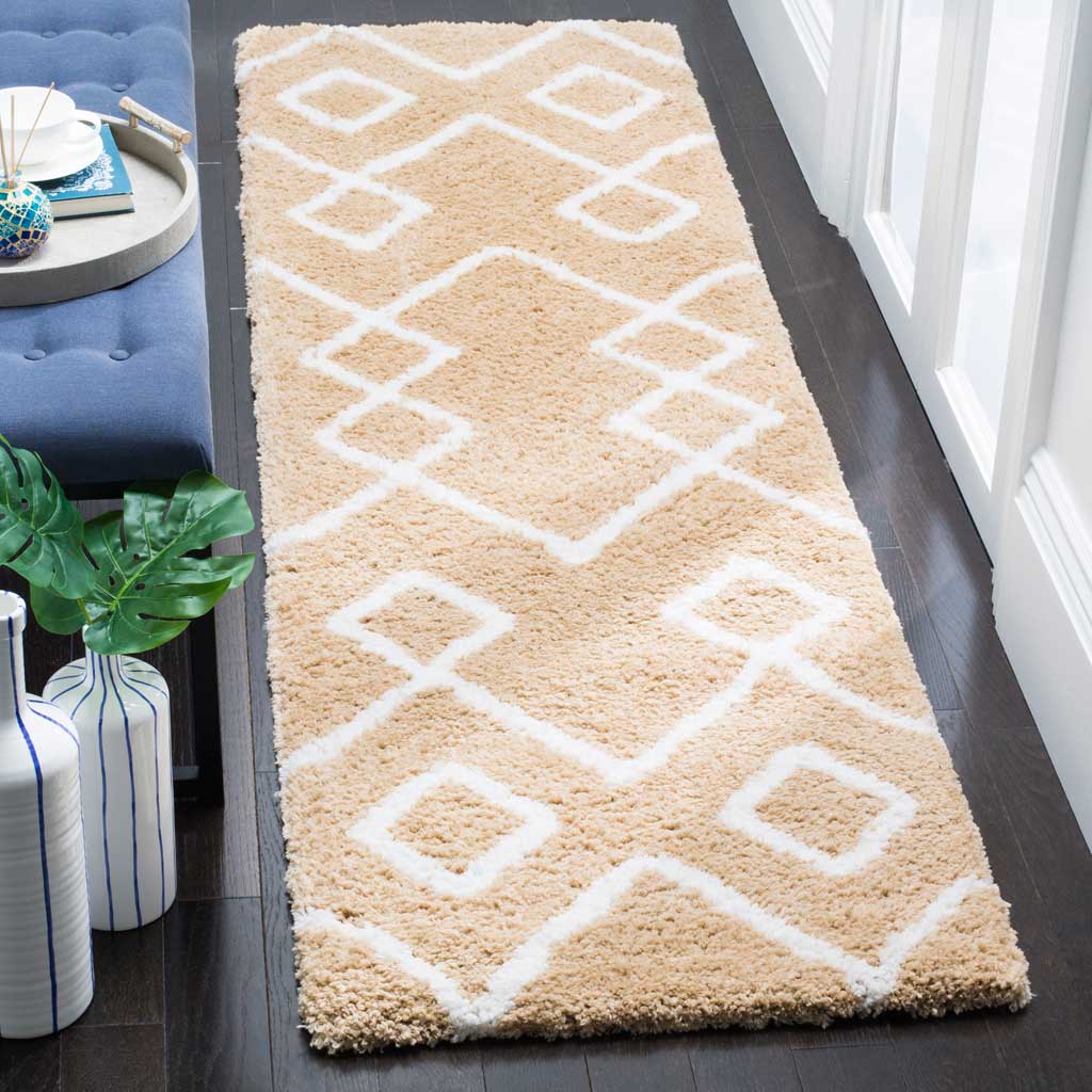 A thick, fluffy beige pile gives this ivory-patterned runner a soft, inviting finish